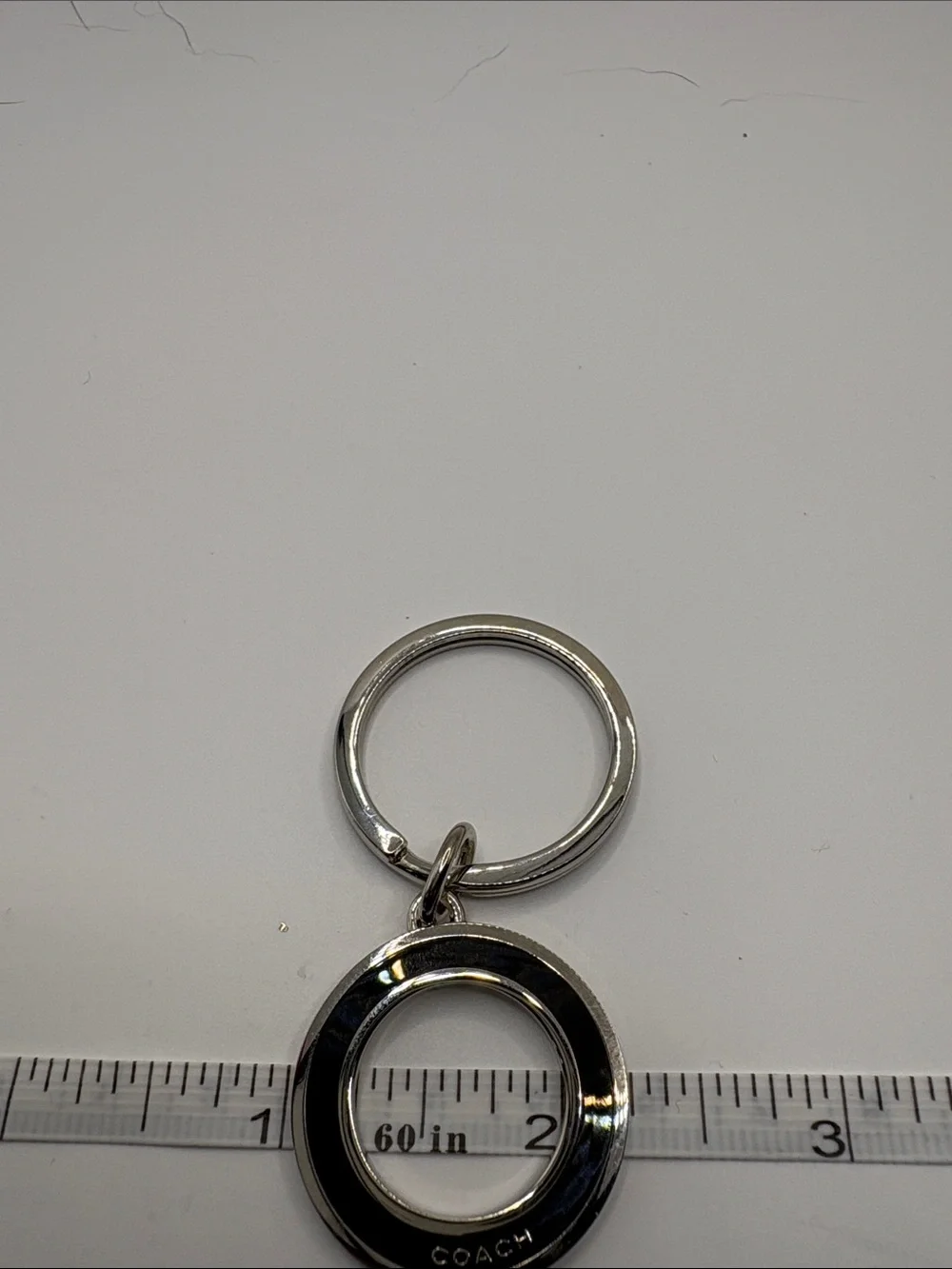 Coach Silver-Tone Round Logo Keyring with Black Accent